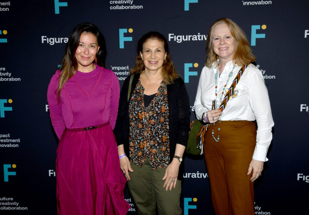 three women pose for a photo