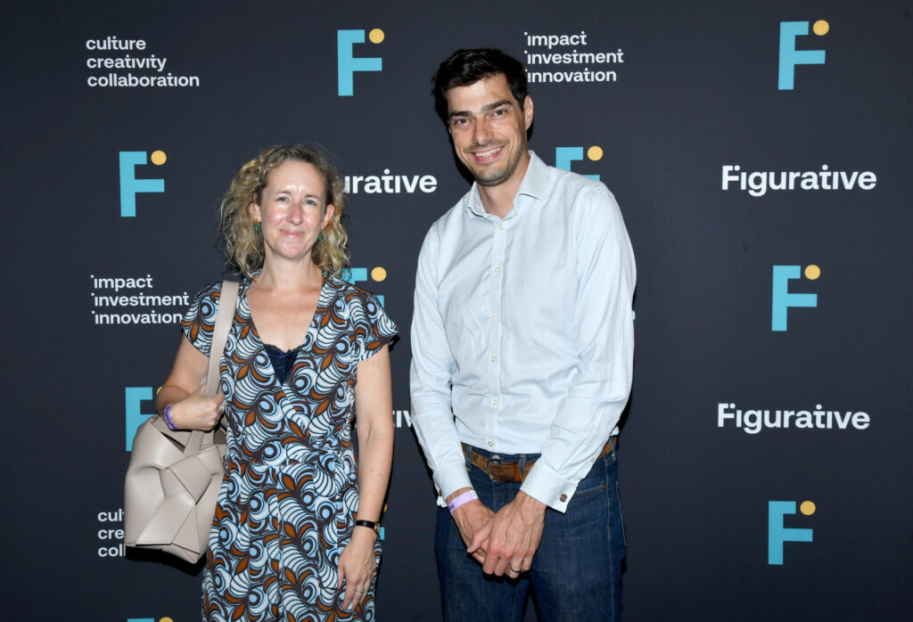 a woman and a man posing for a photo